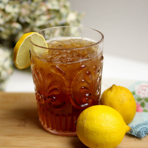 Glass of iced tea with a slide of lemon