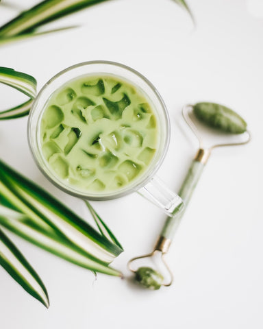 Glass mug with iced matcha tea