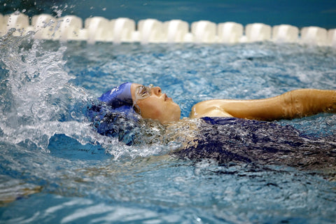 Still image of woman swimming in a swimming pool