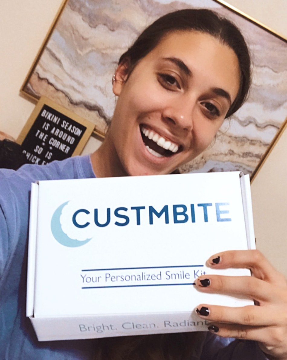 Woman with CustMbite personalized smile kit