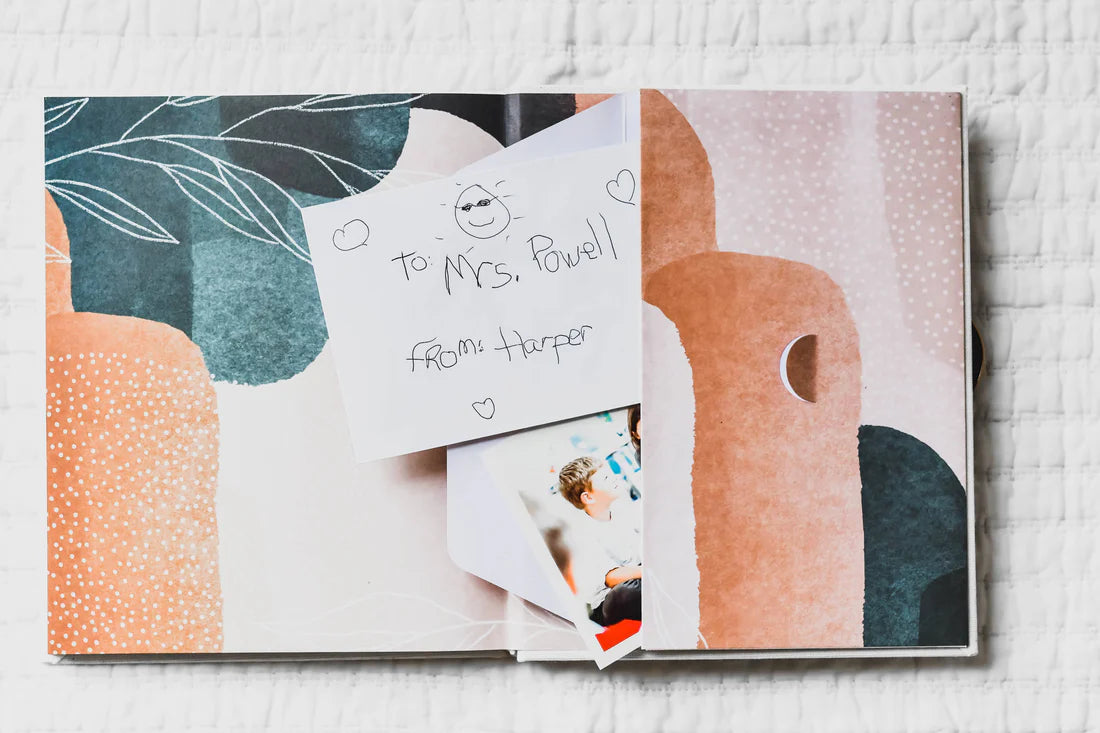 Note from a student to a teacher in the sleeve of a journal