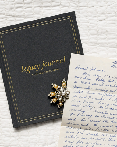Close up of a legacy journal and handwritten letter