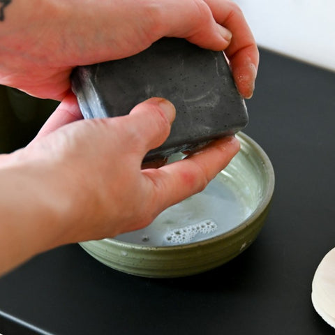 Washing with Charcoal Soap