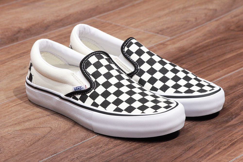 vans checkered slip on price