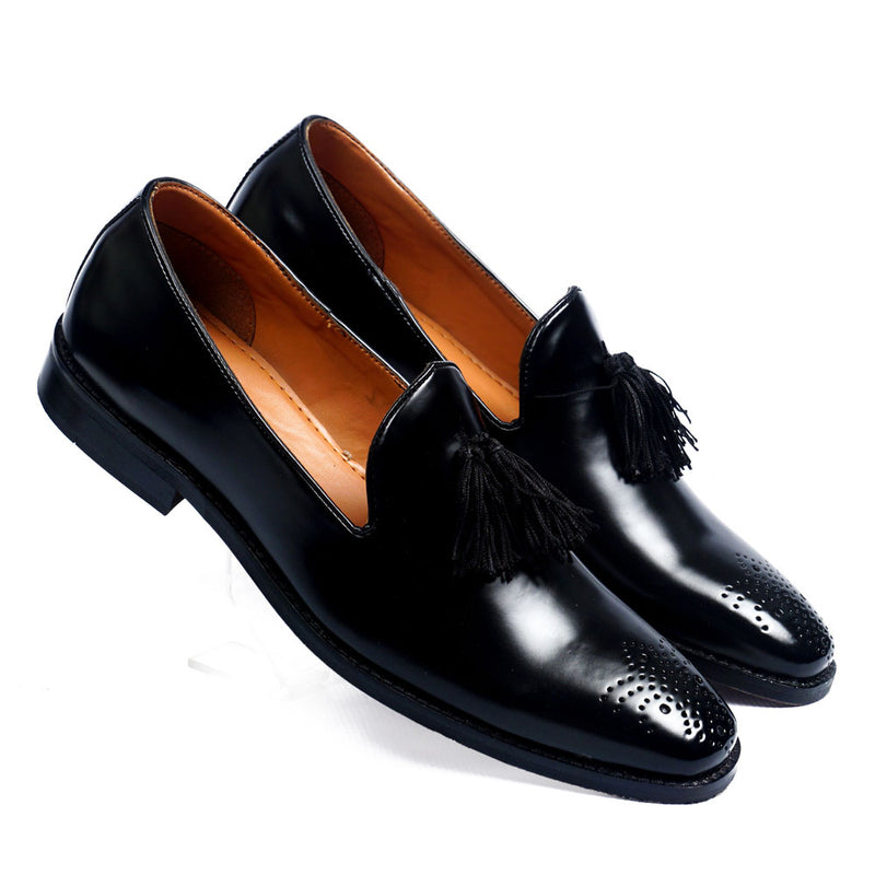 black loafers with tassels