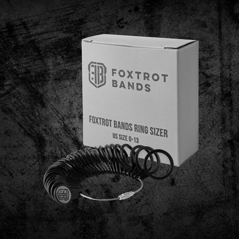 ring sizer box on dark background