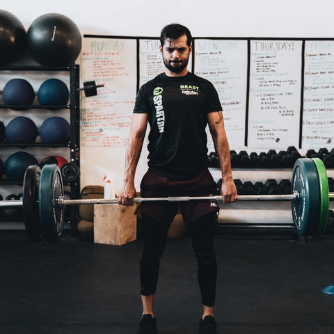 man working out lifting weights