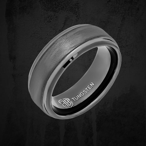 Gray tungsten ring on black background