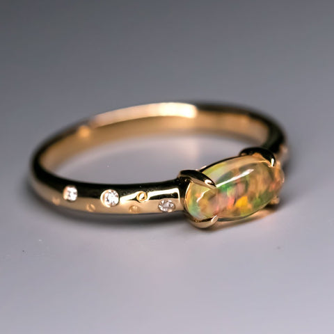 Exquisite 18K Gold Engagement Ring with Mexican Fire Opal Diamonds