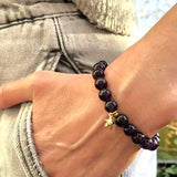 A woman wearing a diffuser bracelet