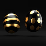 Two black and gold easter eggs