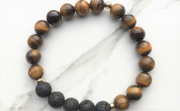 A tiger's eye and lava stone essential oil bracelet
