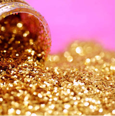 Gold glitter spilling out of a container