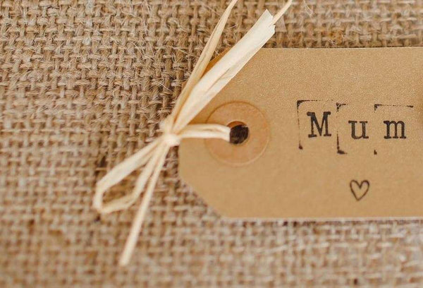 A gift tag with the word "Mum"