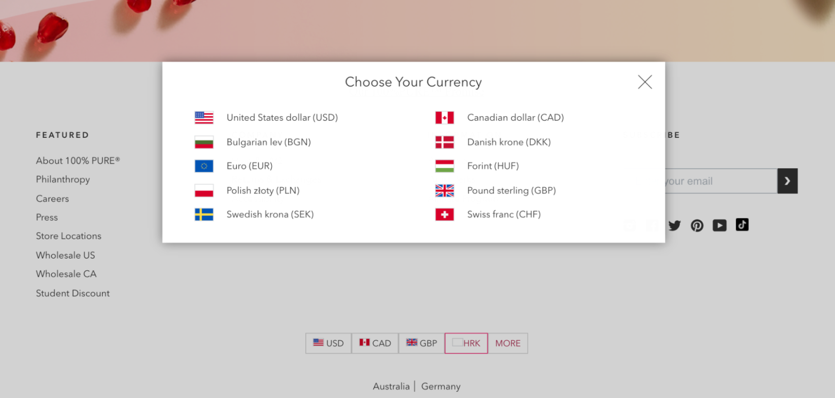 100% PURE 提供简单的国家和货币选择