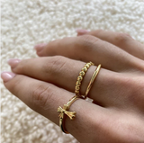 Simple band ring, stackable or can be worn alone. 