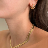 Gold croissant hoops, spice it up or tone it down.