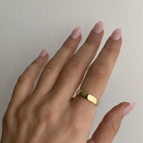 Gold thick band ring, simple but a must.