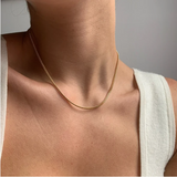 Thin chain necklace, a heavenly touch to any outfit.