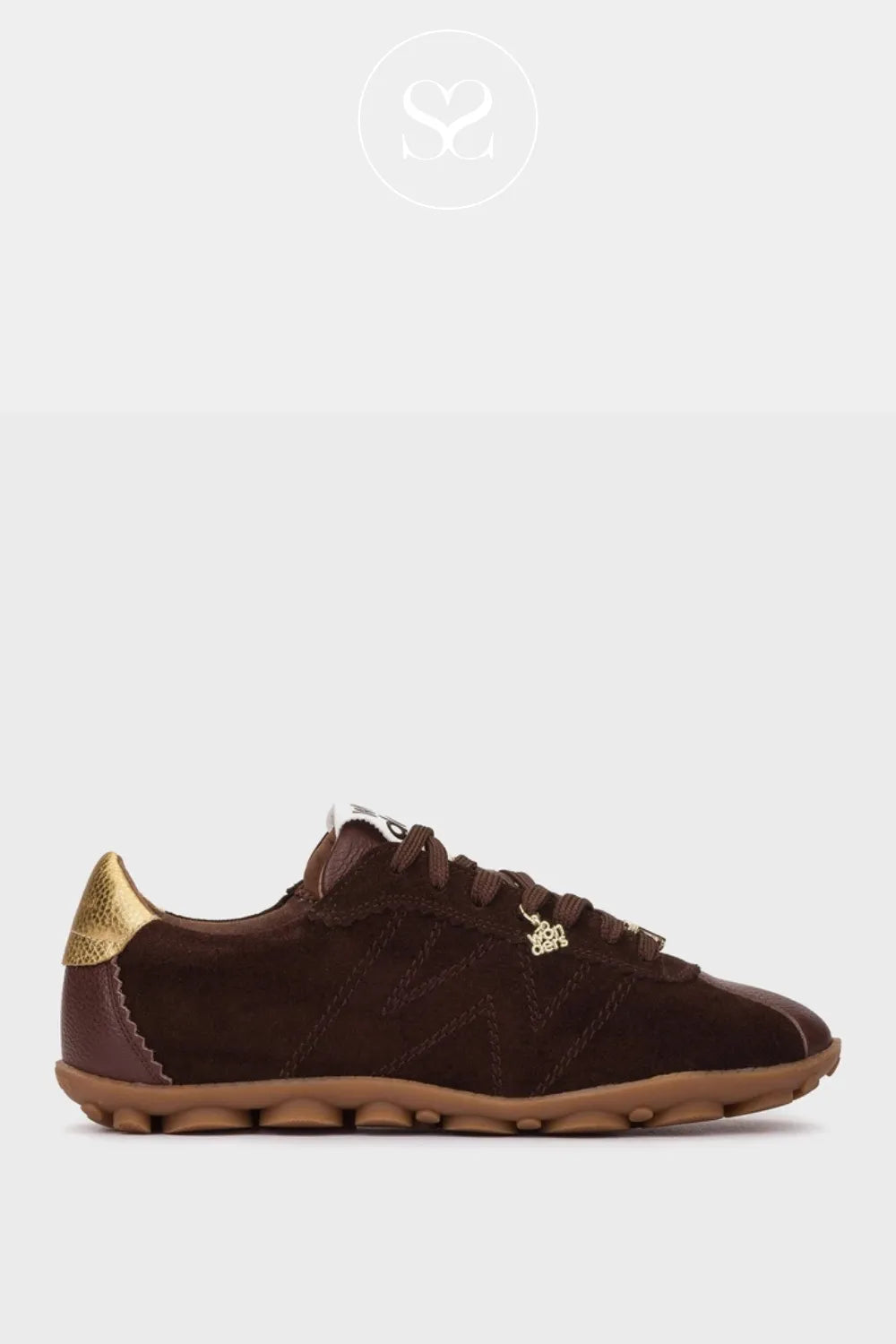 Brown sneaker with gold accents on a white background