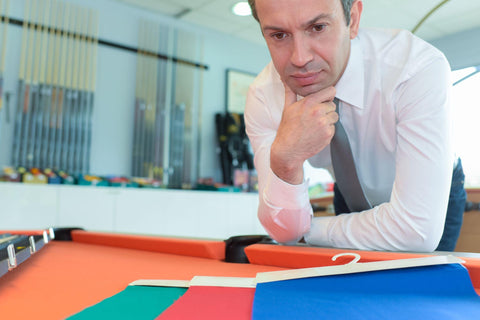 businessman reading a contract on a table