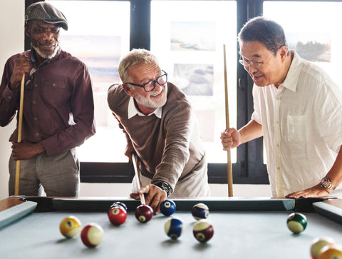 Friends Playing Billiards.