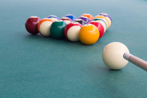 White ball breaking in billiards.