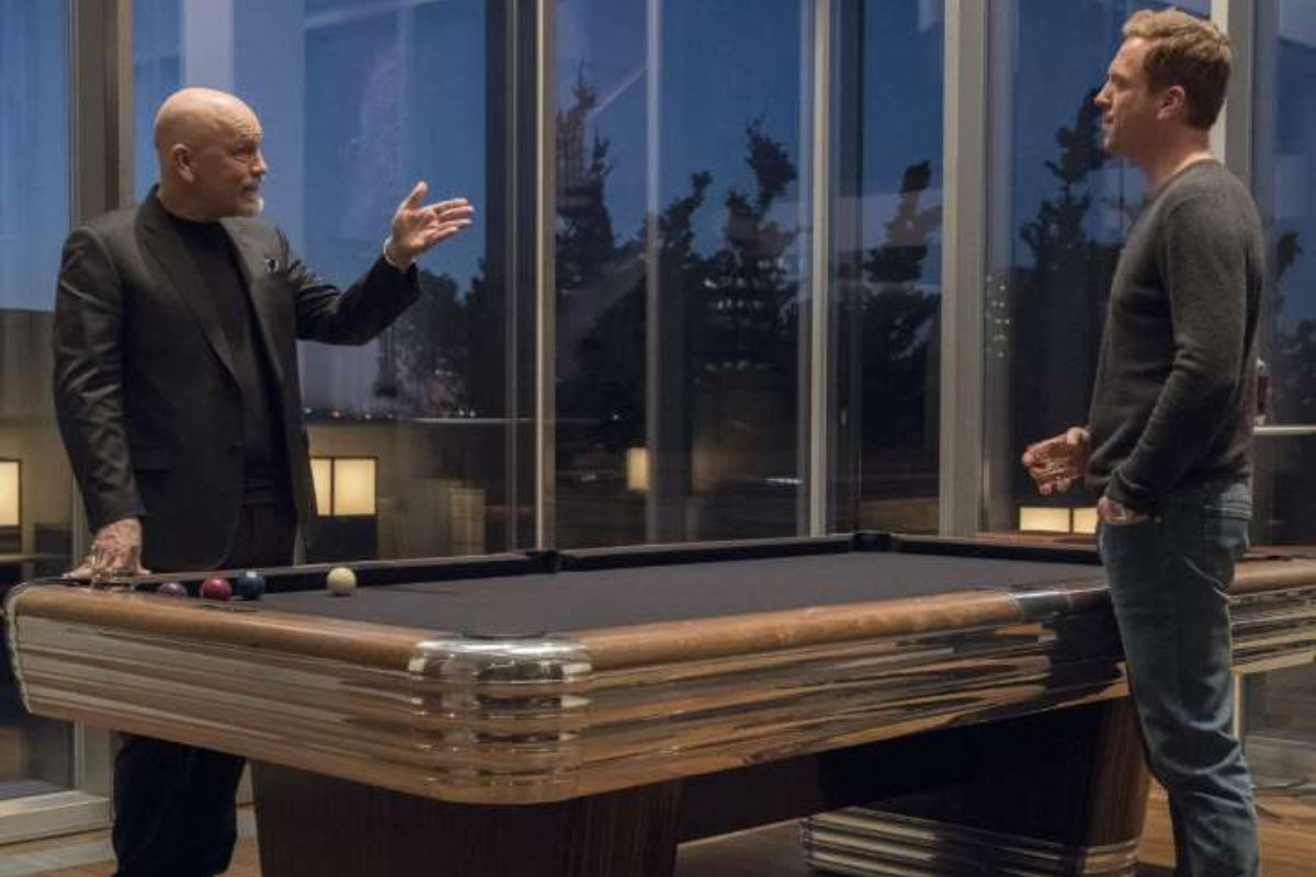 Men talking over pool table