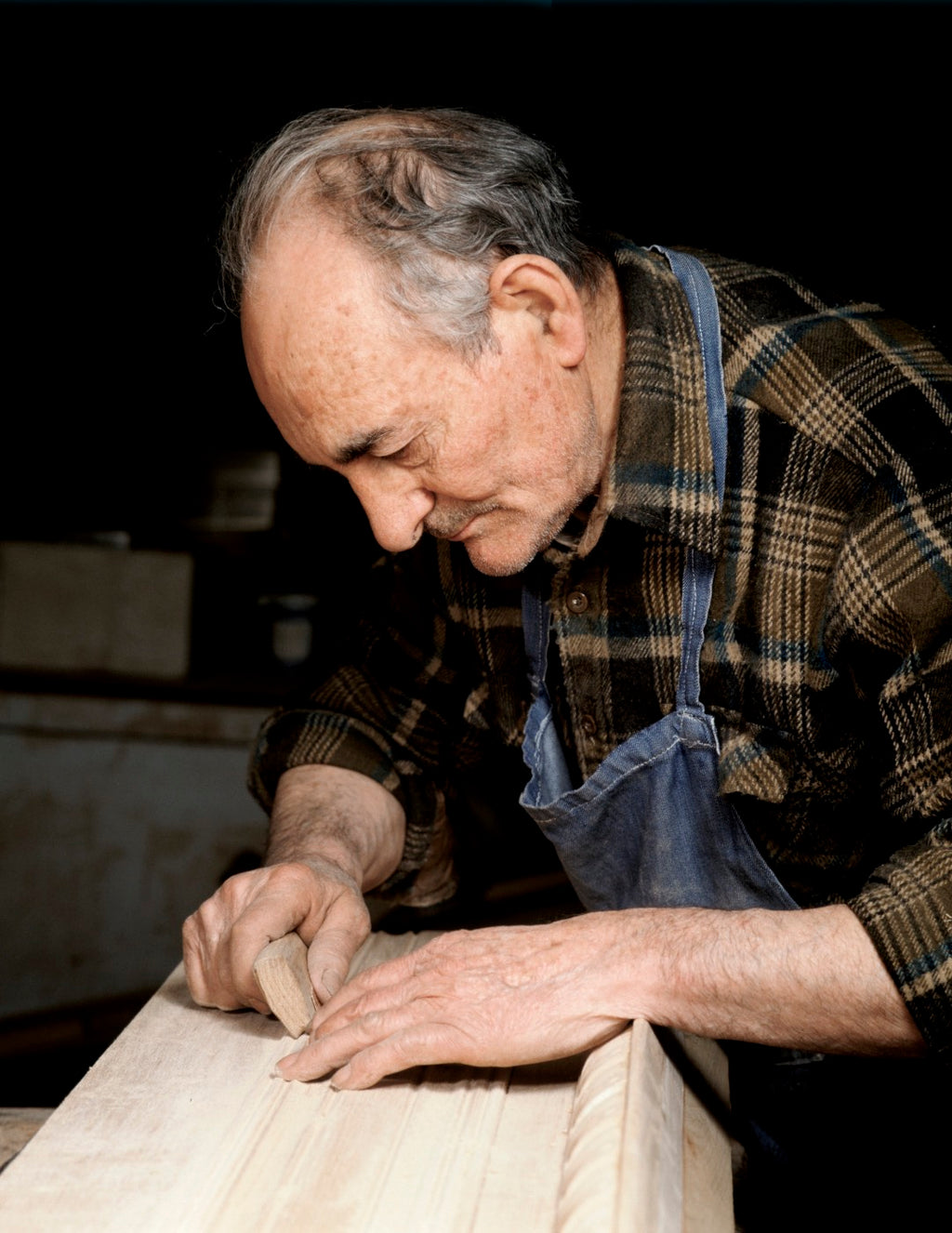 man working on pool table