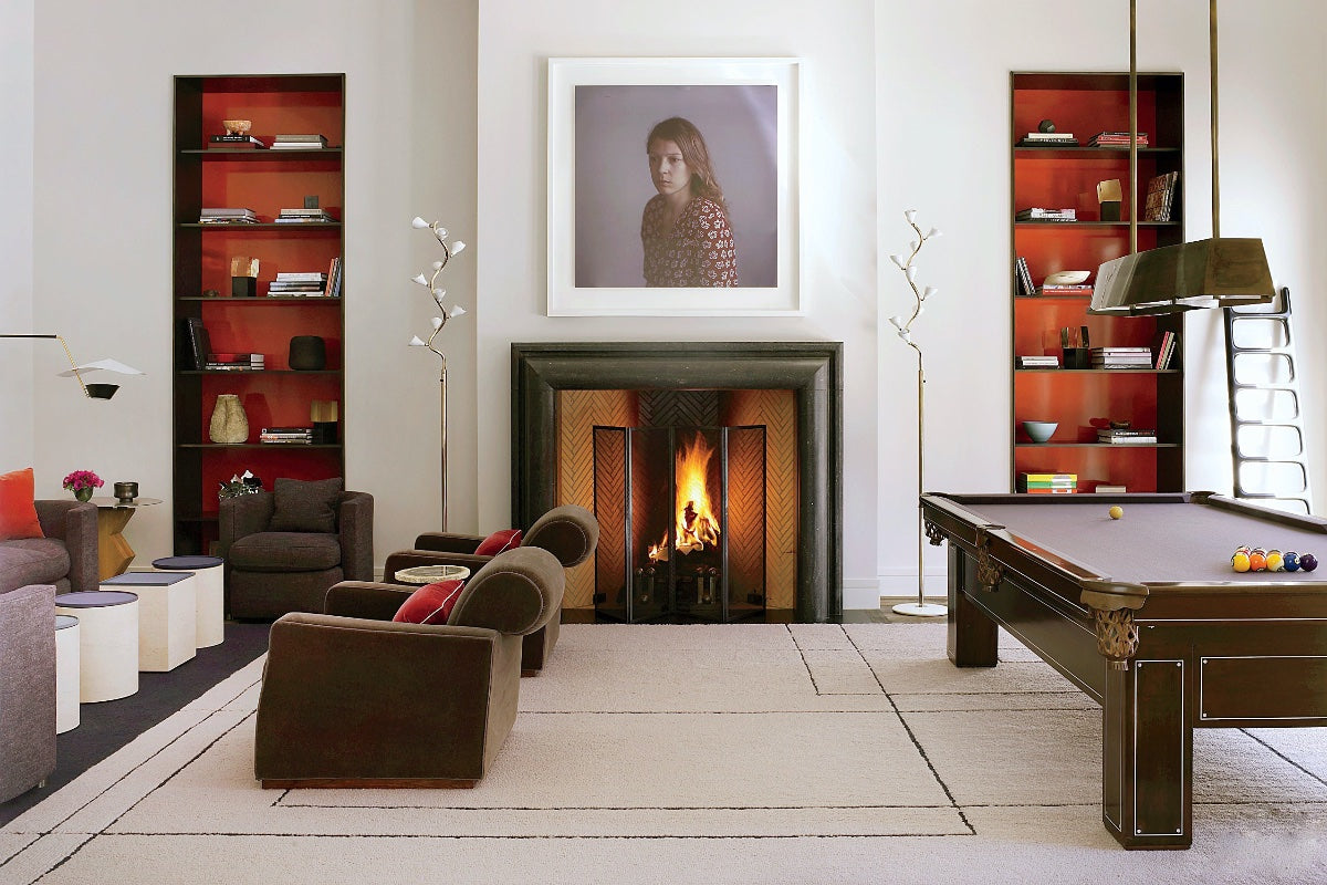 billiards room with fireplace