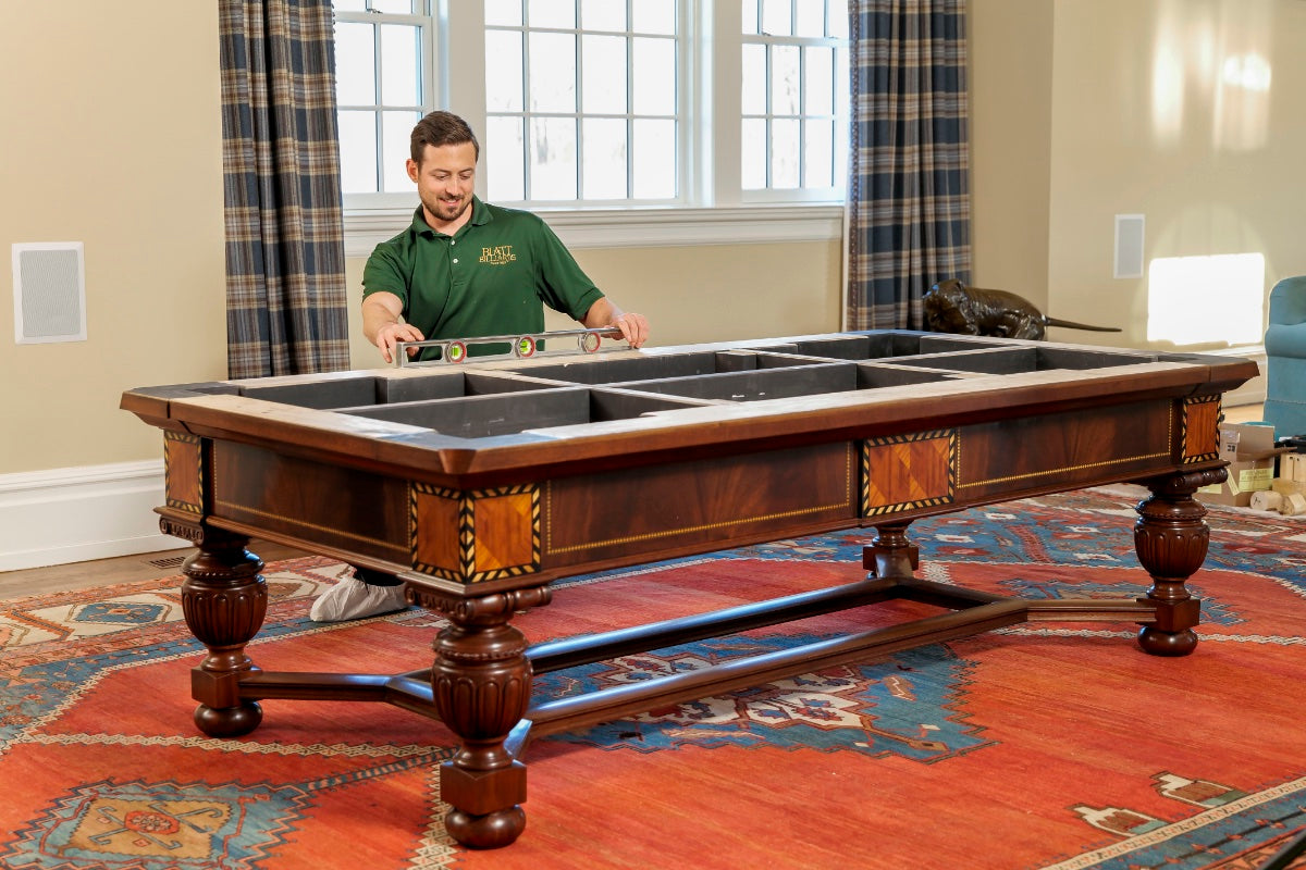 man leveling pool table