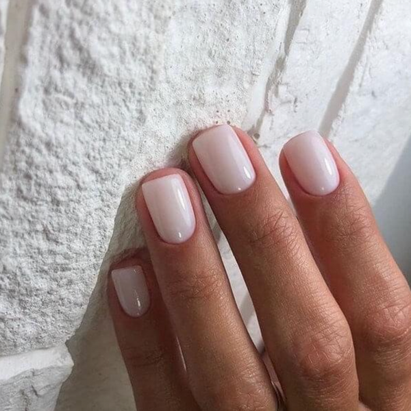 short square natural nails with light pale pink polish