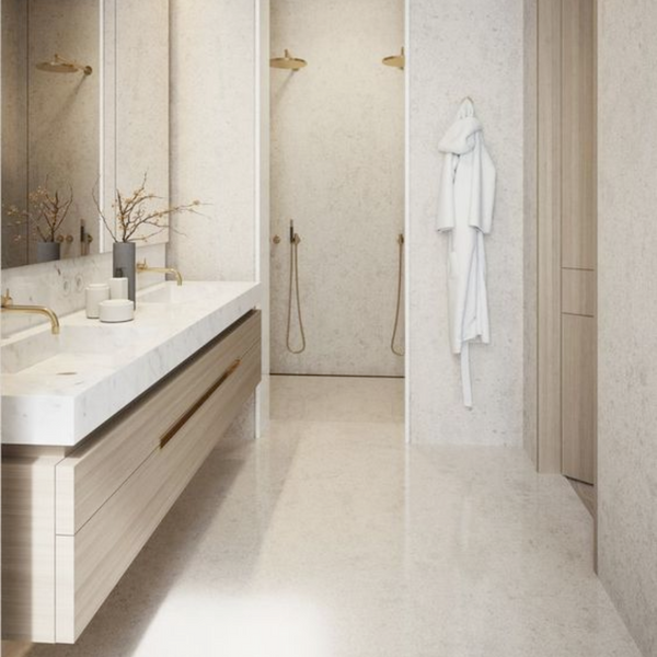 neutral spa like bathroom with white robe hanging on wall