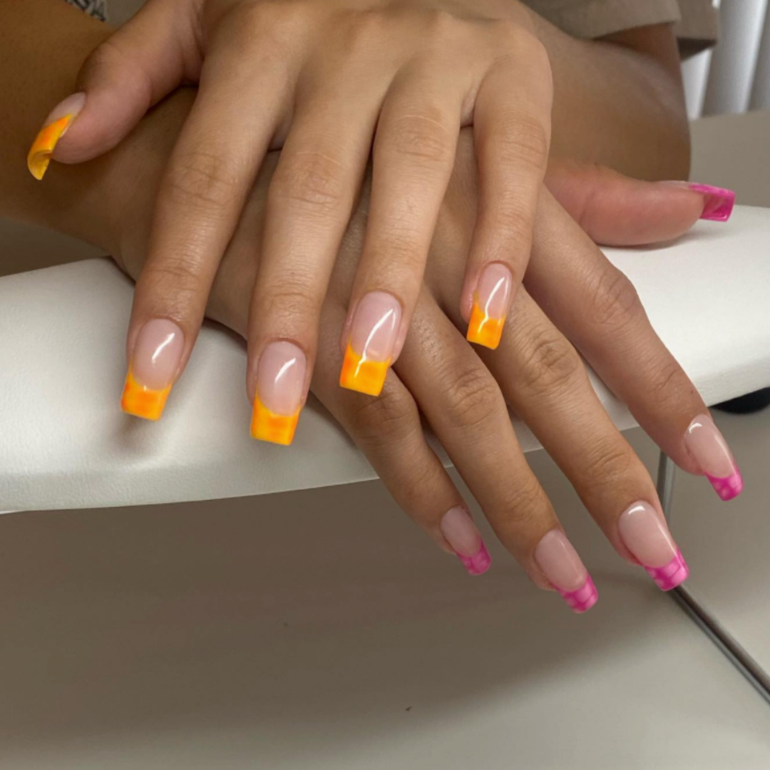 french manicure nails with orange and pink alligator print tips