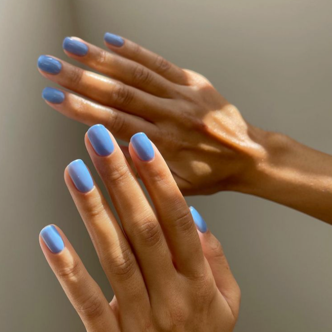 short bright sky blue nails 