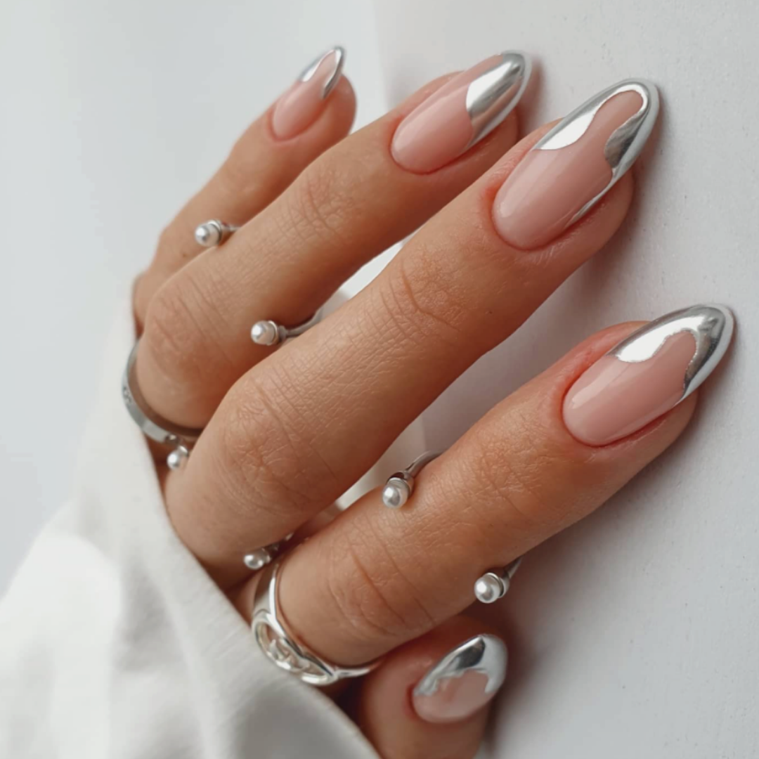 nude nails with chrome abstract design at tip 