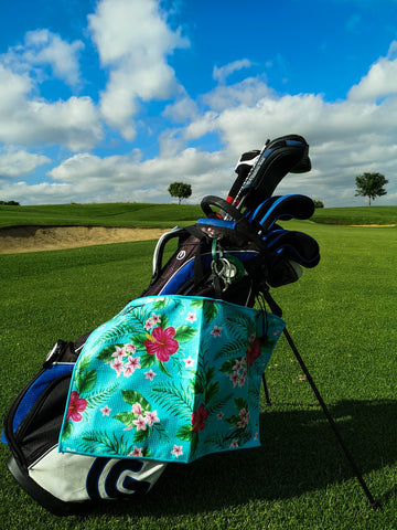 golf gifts for him, floral golf towel hanging on a golf bag