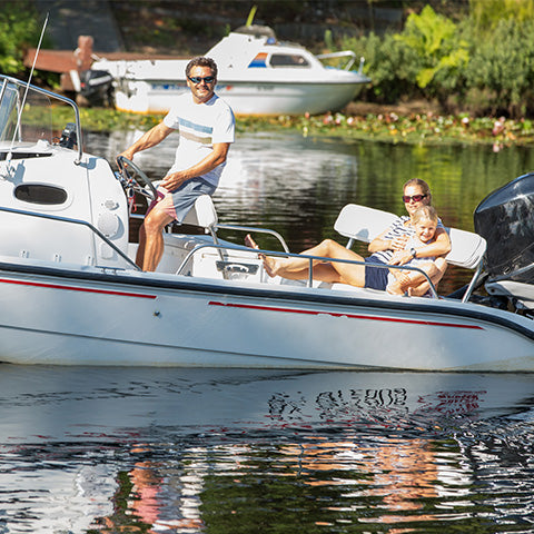 Family Enjoying a nice day together on a boat ride