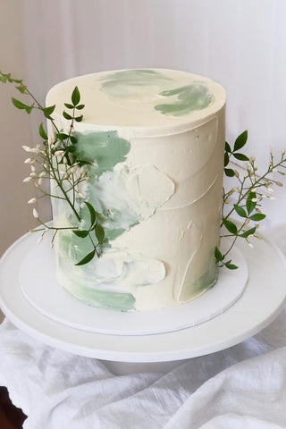 30. Eucalyptus-Inspired Engagement Cake