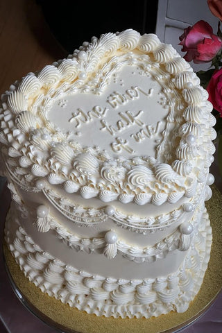 5. Vintage-Themed Engagement Cakes