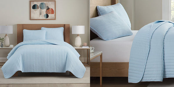 Light blue Quilted Bedspreads and pillow shams on two beds