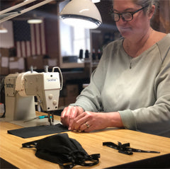 Cathy sewing a mask