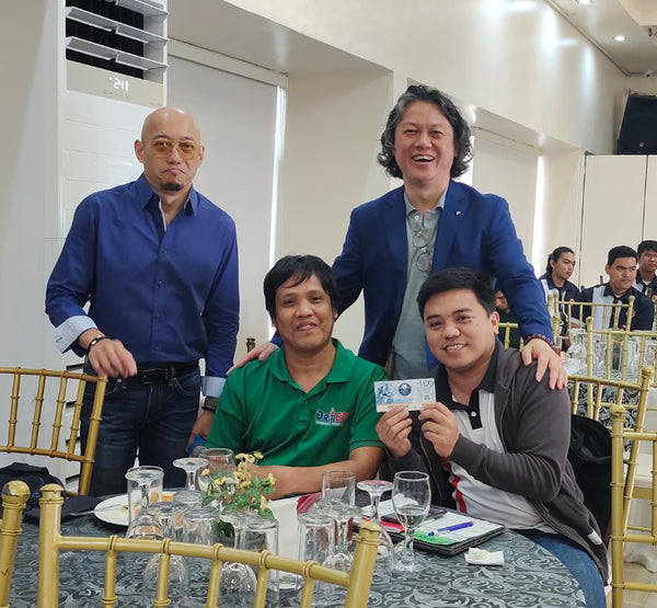 handing over ₱100 sodexo gcs for contest winners