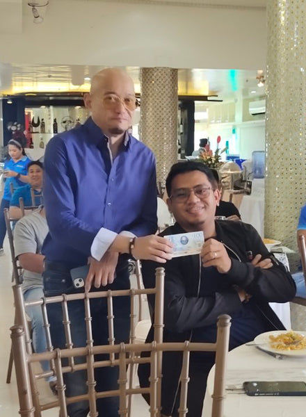 handing over ₱100 sodexo gcs for contest winners