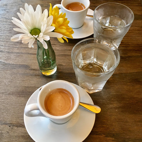 Espresso, a side of water and daisy's at Sapori d'Italia.