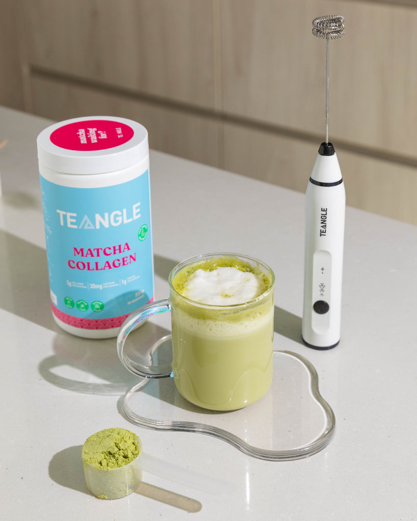 Ingredients for Matcha Collagen Latte including plant-based milk, sweetener, and bamboo whisk