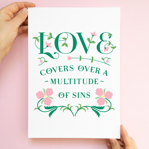 Christian wall art with the quote 'Love covers a multitude of sins'