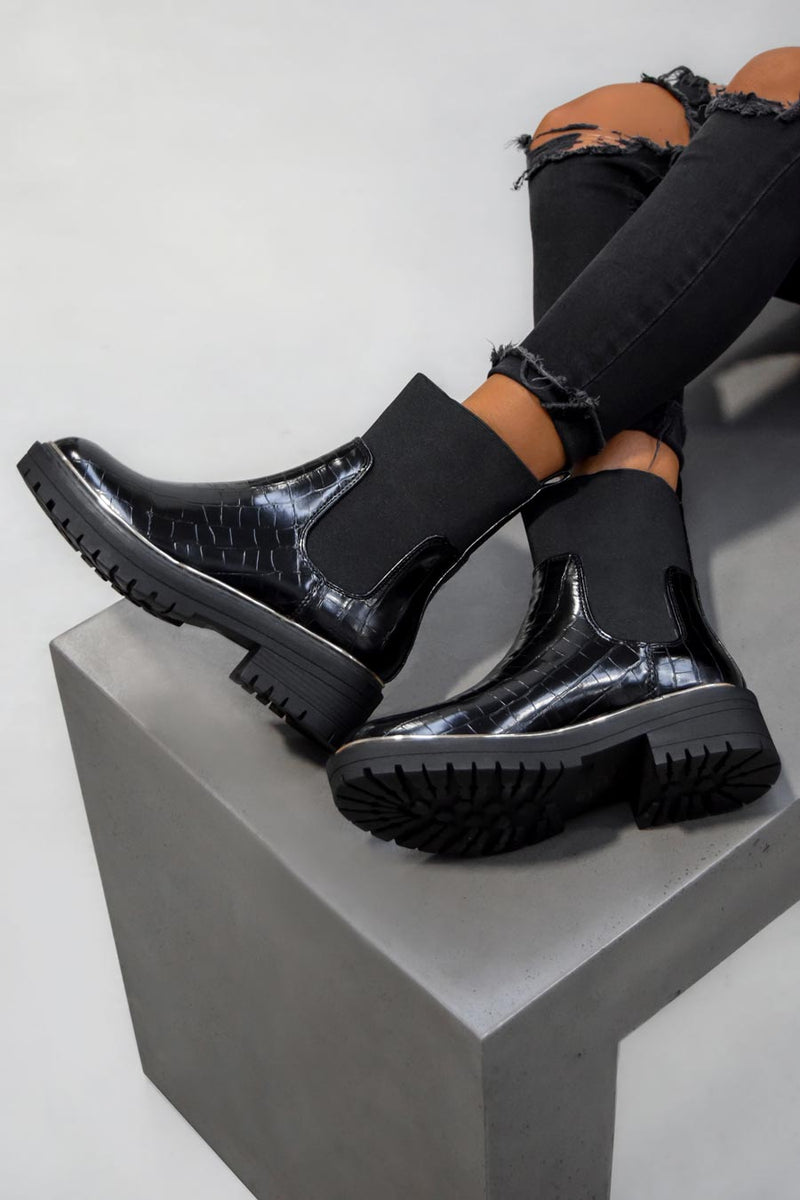 aj voyage croc boots