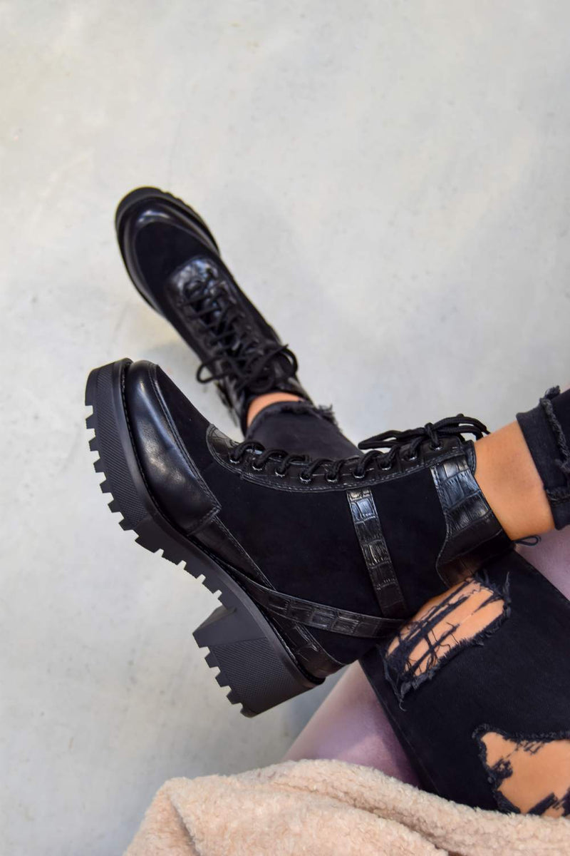 black lace up cleated ankle boot