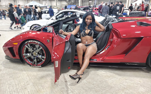 lamborghini with model and owner of co2passions at car show